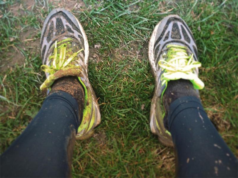 Photo of muddy running kit.